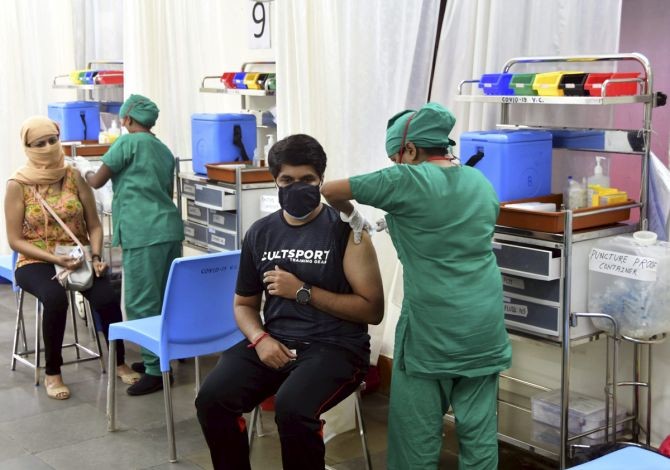 The COVID-19 vaccine is administered at the B Y L Nair Hospital in Mumbai. Photograph: PTI Photo