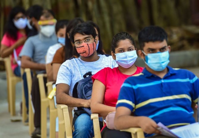 Students queue to receive COVID-19 vaccine doses during a special vaccination drive for students who are going abroad for education and employment, Bengaluru, June 2, 2021. Photograph: Shailendra Bhojak/PTI Photo