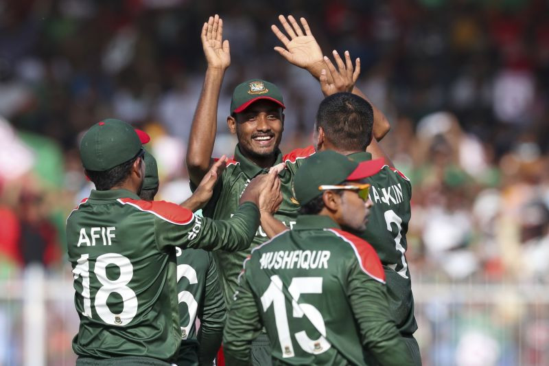 Bangladesh players celebrate the run out of West Indies' Andre Russell during the Cricket Twenty20 World Cup match between the West Windies and Bangladesh in Sharjah, UAE on Ocober. 29, 2021. (AP/PTI Photo)