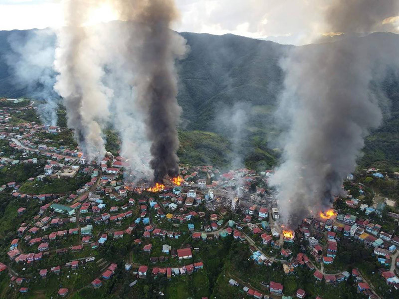 In this photo released by the Chin Human Rights Organization, fires burn in the town of Thantlang in Myanmar's northwestern state of Chin, on Friday Oct. 29, 2021. More than 160 buildings in the town in the northwestern Myanmar, including three churches, have been destroyed by fire caused by shelling by government troops, local media and activists reported Saturday. (AP File Photo)