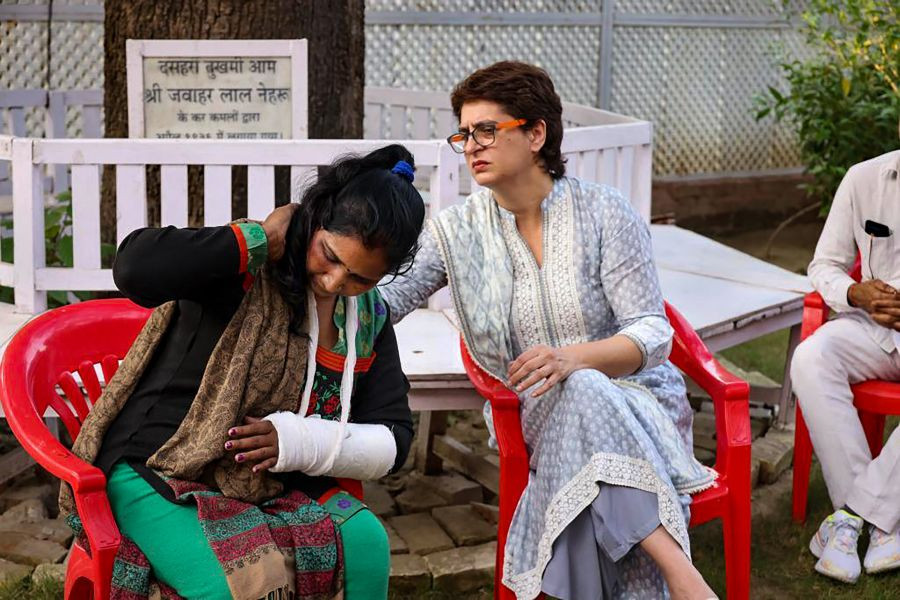 Lucknow: Congress National General Secretary Priyanka Gandhi Vadra with ASHA workers at her Lucknow residence. (PTI Photo)