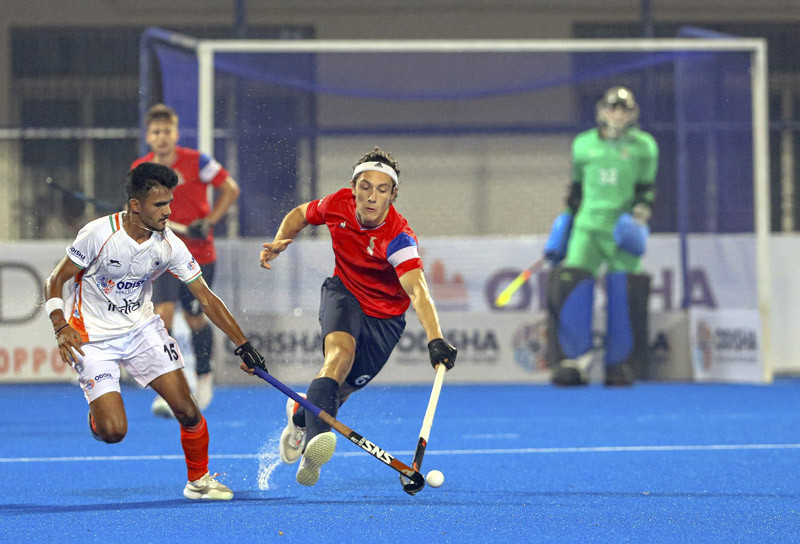 Players vie for ball during FIH Men's Junior Hockey World Cup 2021 match between India and France at Kalinga Stadium, in Bhubaneswar on November 24, 2021. (PTI Photo)