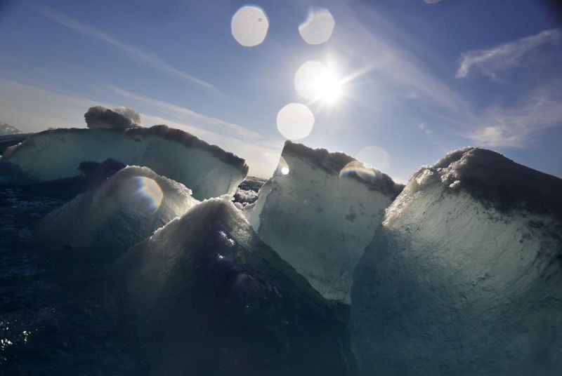Broken blocks of sea ice emerge from under the hull of the Finnish icebreaker MSV Nordica as it sails through the Victoria Strait while traversing the Arctic's Northwest Passage, Friday, July 21, 2017. The Arctic is warming three times faster than the rest of the planet and is on such a knife’s edge of survival that the 2021 U.N. climate negotiations in Scotland could make the difference between ice and water at the top of the world in the same way that a couple of tenths of a degree matter around the freezing mark, scientists say. (AP File Photo)