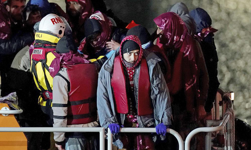 A group of people thought to be migrants are brought in to Dover, England by the RNLI, following a small boat incident in the English Channel, Thursday Nov. 25, 2021. On Wednesday around 30 migrants bound for Britain died when their boat sank in the English Channel, in what France’s interior minister called the biggest migration tragedy on the dangerous crossing to date. (AP Photo)