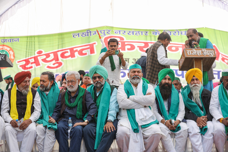 Bharatiya Kisan Union leader Rakesh Tikait and other leaders attend the 'Kisan Mahapanchayat' organised by Samyukt Kisan Morcha (SKM) at Ecogarden in Lucknow, Monday, Nov. 22, 2021. (PTI File Photo)