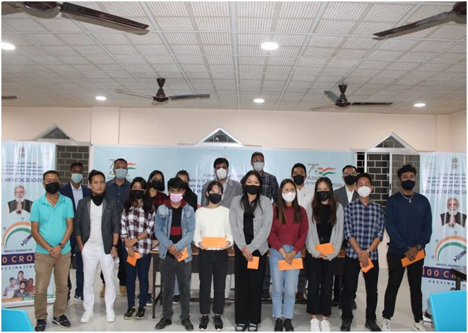 Attendees of the Integrated Communication and Outreach Programme on the theme ‘India’s Journey of 100 crore Vaccination’ organised by Field Outreach Bureau, PIB Kohima at CVScAH, Jalukie on November 16. (Photo: PIB, Kohima)