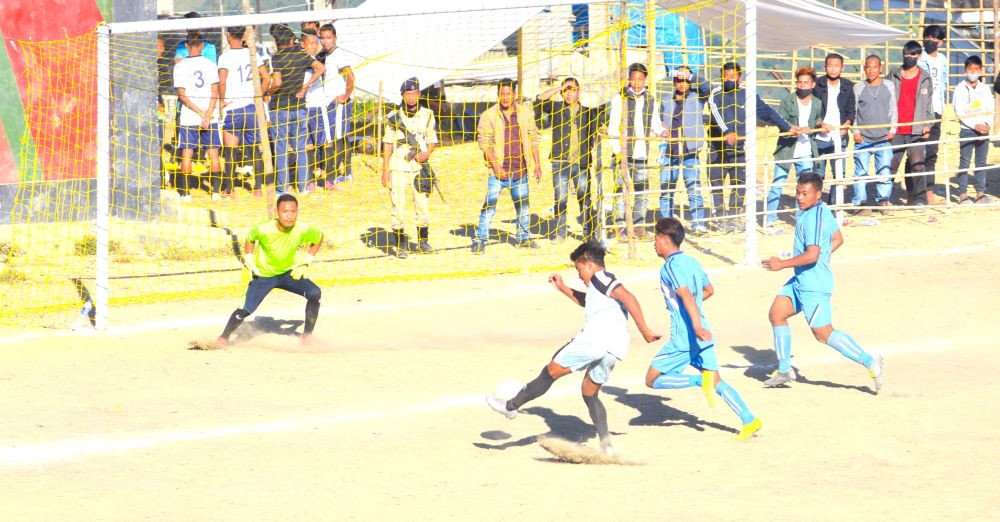Likokmong (2) the captain of Shanen FC scoring the equalizer in the dying minutes of the match against Axios FC in the quarter-final match of the ongoing 29th Loyem Memorial Trophy at Parade Ground, Tuensang. (Morung Photo)