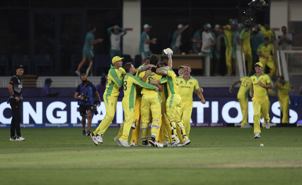 Dubai : Australian cricketers celebrate after winning the Cricket Twenty20 World Cup final match against New Zealand in Dubai, UAE, Sunday, Nov. 14, 2021. AP/PTI