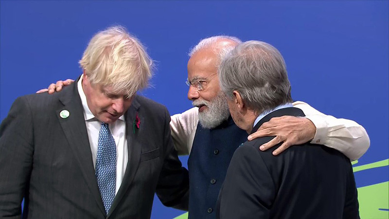 Prime Minister Narendra Modi being received by the Prime Minister of the United Kingdom, Boris Johnson and the Secretary General of the United Nations, Antonio Guterres, on his arrival, at the Scottish Exhibition Centre to attend the World Leaders Summit of COP26, in Glasgow, Scotland. (PTI Photo)