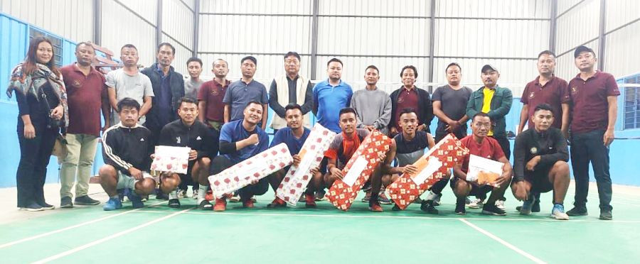 Tournament winners pose for lens with Miathou Krose, Chairman, NHHDCL, ADC Medziphema, OC Medziphema and organisers during the prize distribution ceremony.
