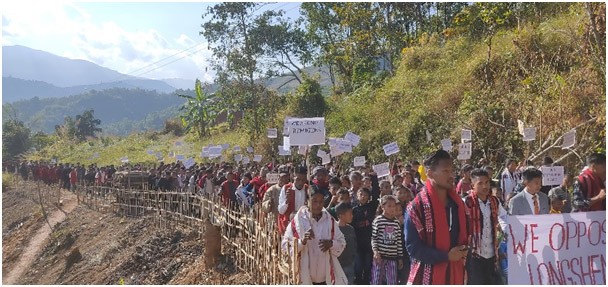 Public take part in the peaceful protest against the shifting of Longshen EAC Hq at Longshen Town from 8:00 am onwards on December 27 last.