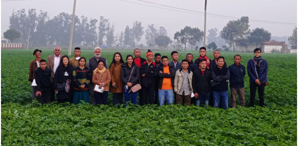 The team with progressive farmers during the three-day exposure trip to Haryana.