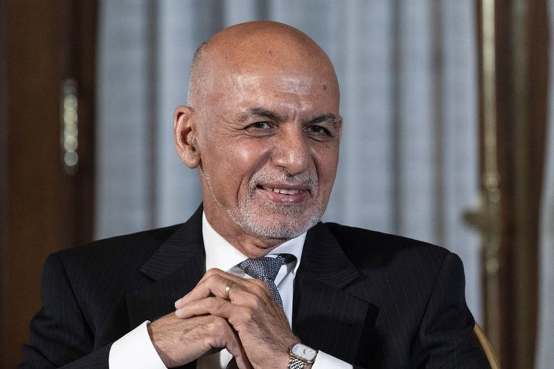 Afghan President Ashraf Ghani is seated after his meeting with U.S. President Joe Biden in Washington, June 25, 2021. In an interview aired by the BBC on Thursday, Dec. 30, 2021, Afghanistan's former president recounts his final hours in office, says he had just minutes to decide to flee and denies an agreement was in the works for a peaceful takeover, disputing accounts of former government officials, Taliban and even a former U.S. negotiator. (AP File Photo)