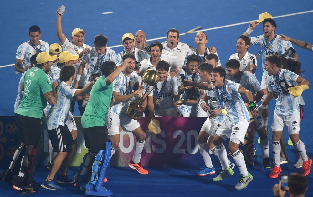 Bhubaneswar: Argentine players jubilate with the trophy after beating Germany in the final match of FIH Odisha Hockey Men's Junior World cup 2021, at Kalinga Stadium in Bhubaneswar, Odisha, Sunday, Dec. 5, 2021. (PTI Photo/Swapan Mahapatra)