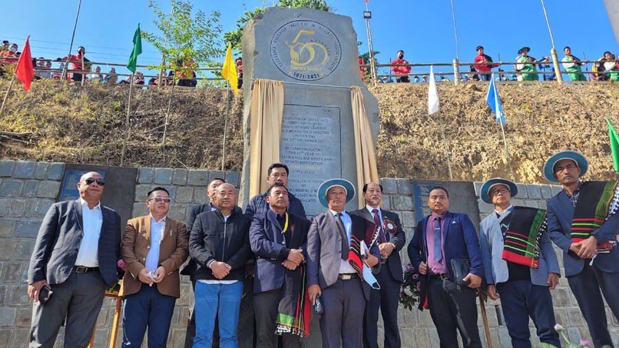 Chief Minister Neiphiu Rio and others after unveiling golden jubilee monolith of Tsiesema Village Youth & Sports Association at Tsiesema village on December 27. (Morung Photo)