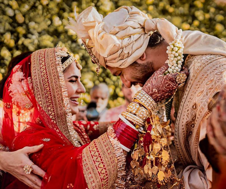 **EDS: HANDOUT PHOTO MADE AVAILABLE FROM PR ON THURSDAY, DEC. 9, 2021** Sawai Madhopur: Bollywood actors Vicky Kaushal and Katrina Kaif during their wedding ceremony at Six Senses Fort Barwara in Sawai Madhopur. (PTI Photo)