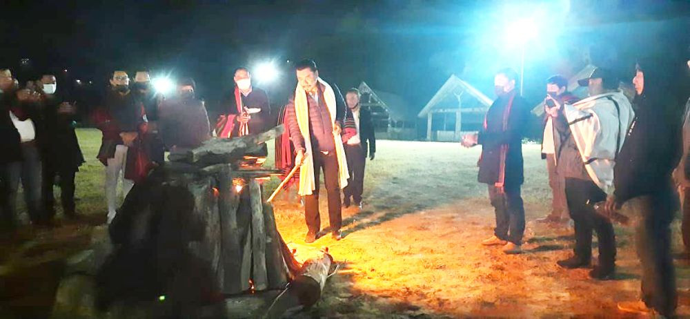 Chairman NKVIB Neiphrezo Keditsu lighting the bonfire at the inauguration of the KYO traditional evening park 1 at Kigwema village on December. (Morung Photo)