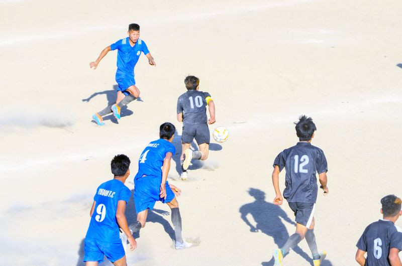 Vikings FC (Black) Vs Vision FC (Blue) in the ongoing TDFA cup at Parade Ground, Tuensang on December 2. Oziepik FC defeated Young Flame Shooters FC by 7-0. The scorers are Sangtsoi (hat trick), Longkhoi (2 goals), Muthiu and Hempao. In the 2nd match, Rise of Strangers defeated Olala FC by 6-0. The scorers are Yemti Chuba (2 goals), Chaang Chuba, Yentin Ongbou, Koma Baso and Sangte. In the 3rd match, Vision FC defeated Vikings FC 4-1. The scorers for Vision are Pule (2 goals), M. Putse and Chingkong. N Chingmak scored the only goal for Vikings. (Morung Photo)