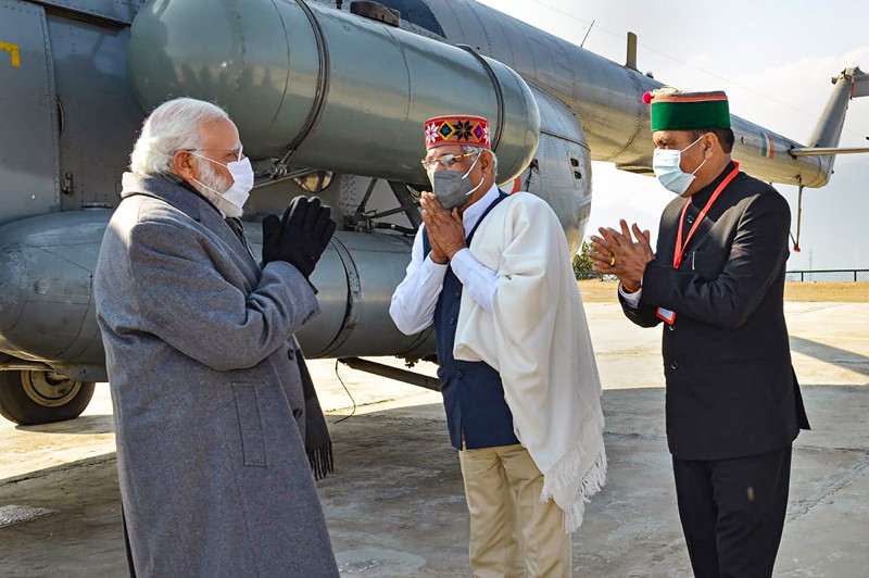 Prime Minister Narendra Modi being greeted by Himachal Pradesh CM Jai Ram Thakur on his arrival in Mandi. (PTI Photo)