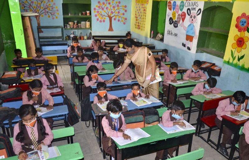 Students wearing masks attend a class after schools resumed. (PTI File Photo)