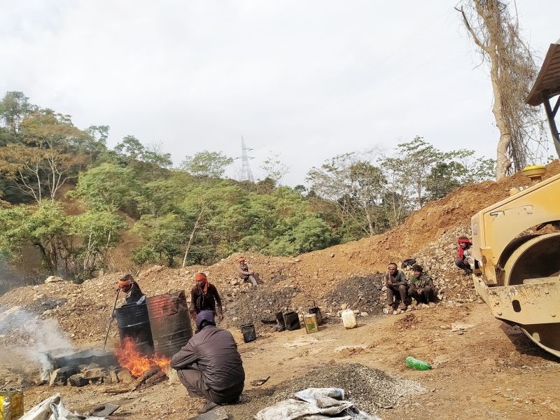 Workers engaged in construction of the two-lane road along the NH2 that passes through Wokha town. The widening of existing highway into a two-lane road commenced four years back. (Morung Photo)