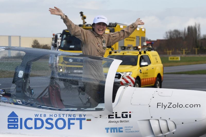 Belgium-British teenage pilot Zara Rutherford jubilates in the cockpit after landing her Shark ultralight plane at the Kortrijk airport in Kortrijk, Belgium on January 20, 2022. The 19-year-old Belgium-British pilot Zara Rutherford has set a world record as the youngest woman to fly solo around the world, touching her small airplane down in western Belgium on Thursday, 155 days after she departed. Rutherford will find herself in the Guinness World Records book after setting the mark that had been held by 30-year-old American aviator Shaesta Waiz since 2017. (AP/PTI Photo)