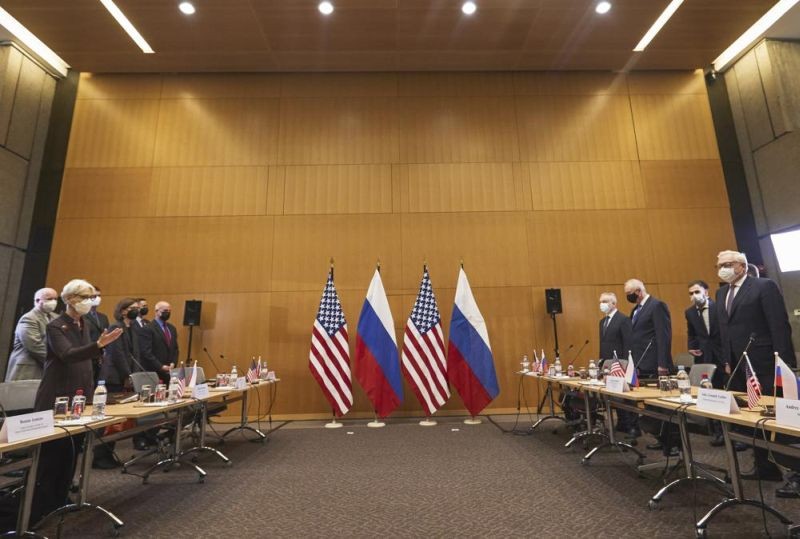 US Deputy Secretary of State Wendy Sherman, left, and Russian deputy Foreign Minister Sergei Ryabkov, right, attend security talks at the United States Mission at the United States Mission in Geneva, Switzerland, Monday, Jan. 10, 2022. (AP Photo)