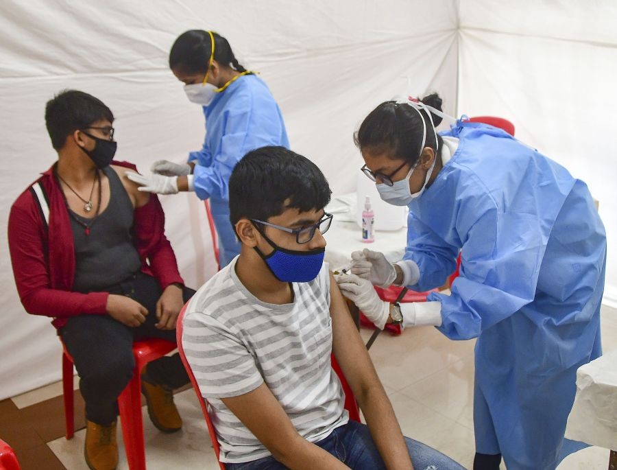 Mumbai: Students get inoculated against Covid-19 during a vaccination drive for teenagers in the 15-18 years age group, at Lower Parel, in Mumbai, Saturday, Jan. 22, 2022. (PTI Photo)