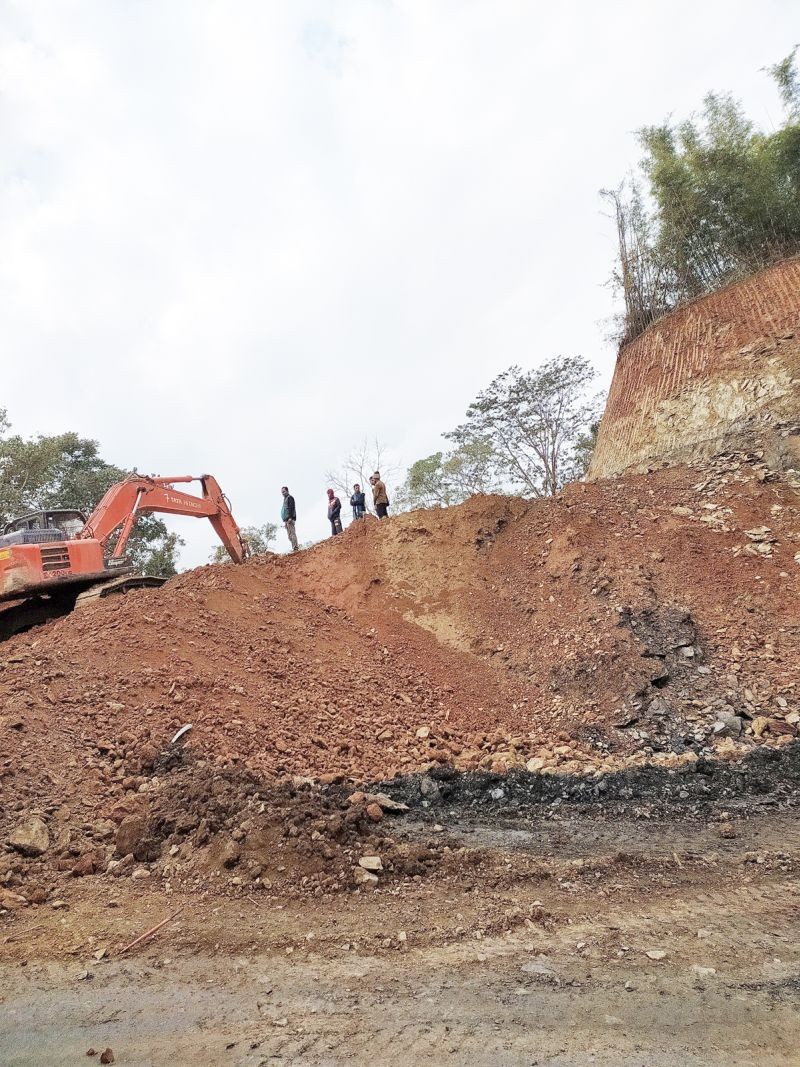 Workers engaged in construction of the two-lane road along the NH2 that passes through Wokha town. The widening of existing highway into a two-lane road commenced four years back. (Morung Photo)