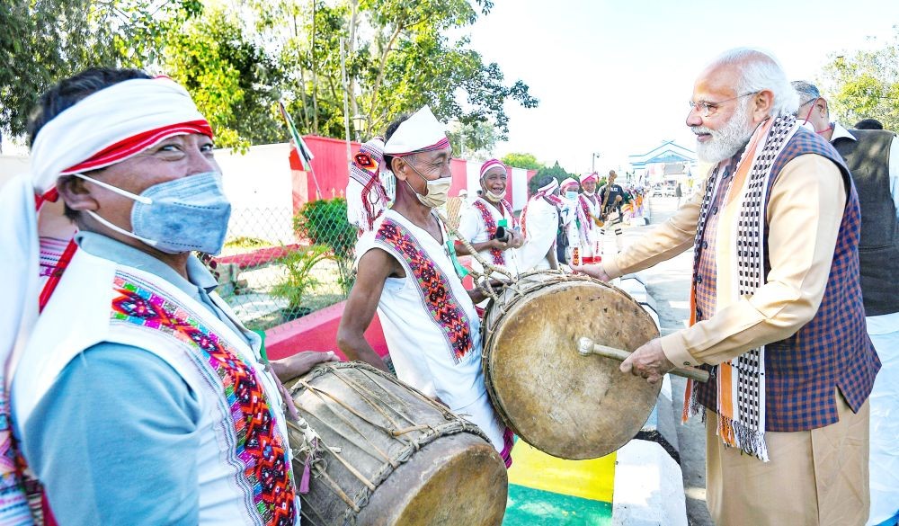 Prime Minister Narendra Modi plays a drum during his visit to Manipur on January 4. (PTI Photo)