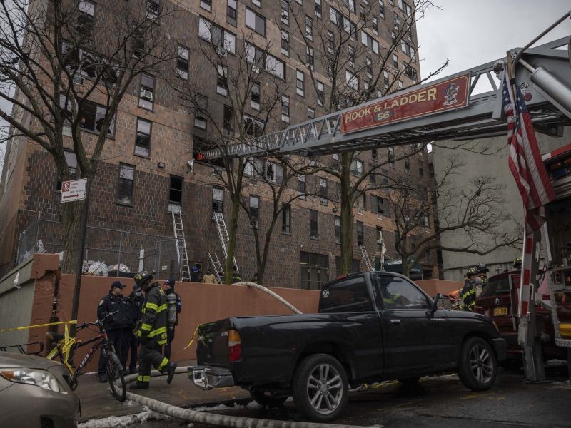 Emergency personnel work at the scene of a fatal fire at an apartment building in the Bronx on January 9, 2022, in New York. The majority of victims were suffering from severe smoke inhalation, FDNY Commissioner Daniel Nigro said. (AP/PTI Photo)