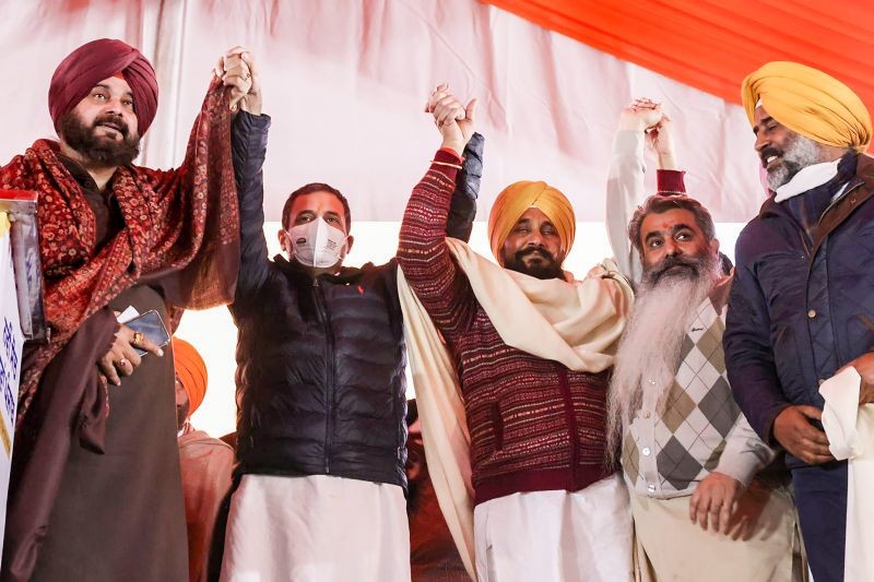 Congress leader Rahul Gandhi with Punjab CM Charanjit Singh Channi and PPCC President Navjot Singh Sidhu during the 'Navi Soch Nava Punjab' virtual rally. (PTI Photo)