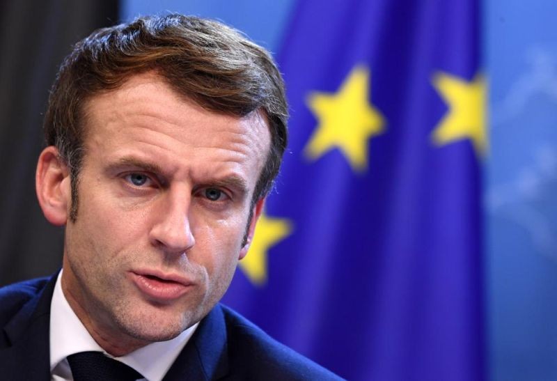 French President Emmanuel Macron addresses a media conference at the conclusion of an EU Summit in Brussels, Friday, Dec. 17, 2021. President Emmanuel Macron has provoked outcries in parliament and shrill protests from election rivals by using a vulgarity to describe his strategy for pressuring vaccine refusers to get coronavirus jabs. (AP FIle Photo)