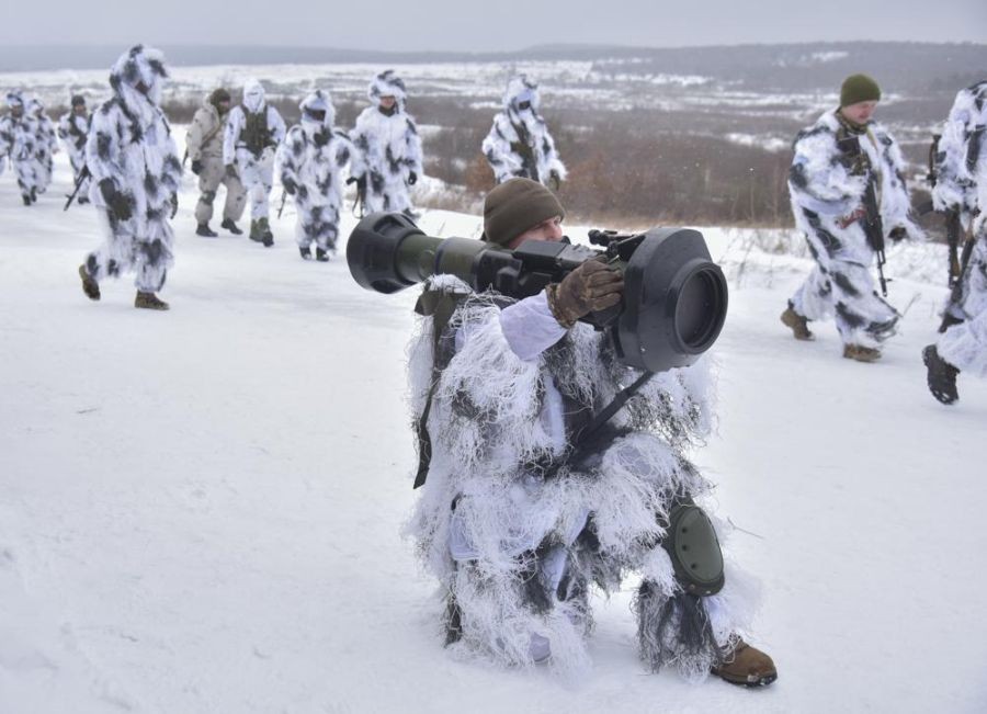 Soldiers take part in an exercise for the use of NLAW anti-aircraft missiles at the Yavoriv military training ground, close to Lviv, western Ukraine on January 28, 2022. British defense secretary Ben Wallace told the U.K. had already delivered 2,000 NLAWs to Ukraine, a number he indicated might continue to rise. The missiles were London's way of providing defensive aid to Kyiv as Russian forces deploying around Ukraine's borders give the impression a new invasion may be imminent. (AP Photo)