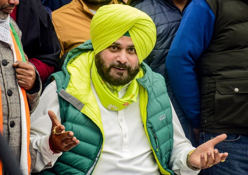 Punjab Congress President Navjot Singh Sidhu addresses a press conference ahead of Punjab elections, in Amritsar on January 17, 2022. Election Commission postponed the Punjab elections in view of Guru Ravidas Jayanti on Feb. 16, after requests from several political parties. The elections will now be conducted on Feb. 20 instead of the earlier date of Feb. 14. (PTI Photo)
