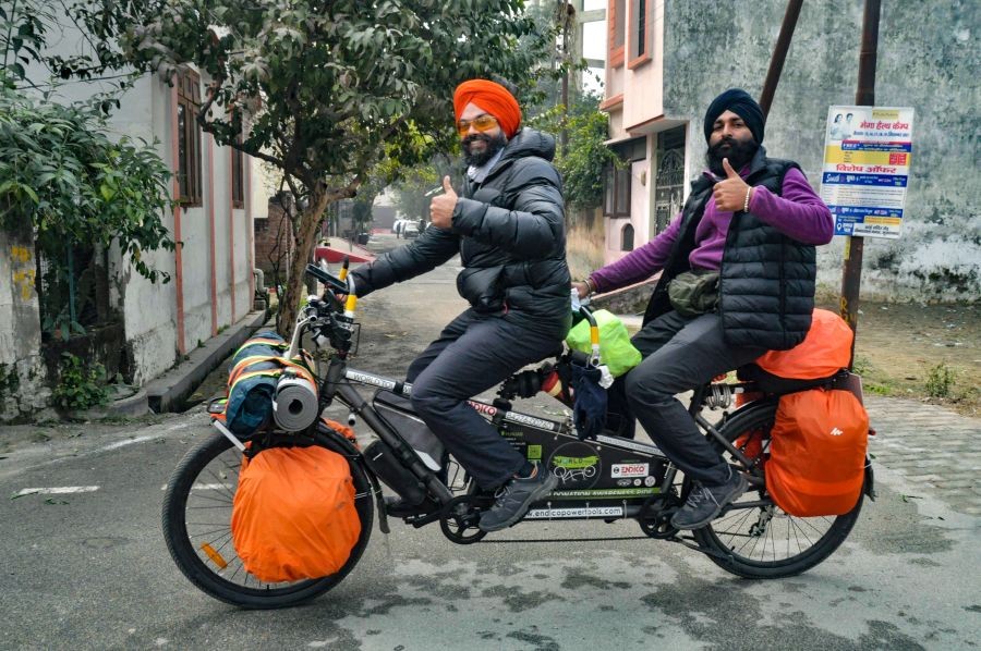 Moradabad: Men ride a modified bicycle to raise awareness about organ donation, in Moradabad, Thursday, Jan. 20, 2022. (PTI Photo)