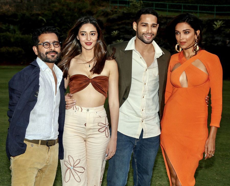 Mumbai: Bollywood actors Deepika Padukone, Siddhant Chaturvedi and Ananya Panday with Director Shakun Batra during a promotional event of their upcoming film 'Gehraiyaan', in Mumbai, Monday, January 24, 2022. (PTI Photo)(PTI01_24_2022_000272B)