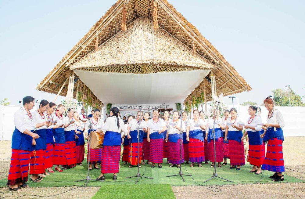 Womenfolk of Aoyimti performing a folk tune at the village’s 75th founding anniversary at the village playground on January 7. (Morung Photo)