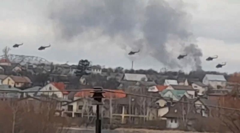 In this handout photo taken from video released by Ukrainian Police Department Press Service, Military helicopters apparently Russian, fly over the outskirts of Kyiv, Ukraine on February 24, 2022. Russian troops have launched their anticipated attack on Ukraine. Big explosions were heard before dawn in Kyiv, Kharkiv and Odesa as world leaders decried the start of an Russian invasion that could cause massive casualties and topple Ukraine's democratically elected government. (AP/PTI Photo)