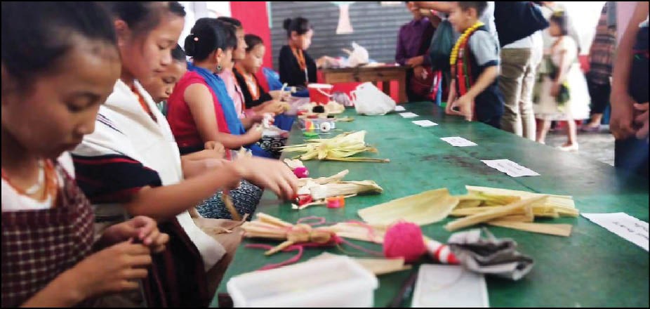 Students being introduced to craft making at the Cultural Day observed at Khedi Baptist Higher Secondary School. (Morung Photo)