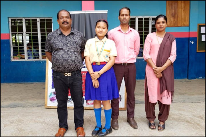 Kemesanuo Rio with the Headmaster Johny Abraham and Science Teachers Princy Sajeev & Rama Rao. (Photo Courtesy: St John School)