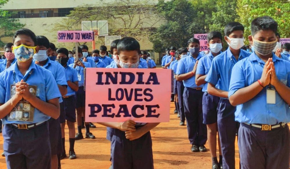 Chennai: A student holds a placard during a prayer session for world peace, amid Russian military invasion of Ukraine, in Chennai, Friday, Feb. 25, 2022. (PTI Photo)