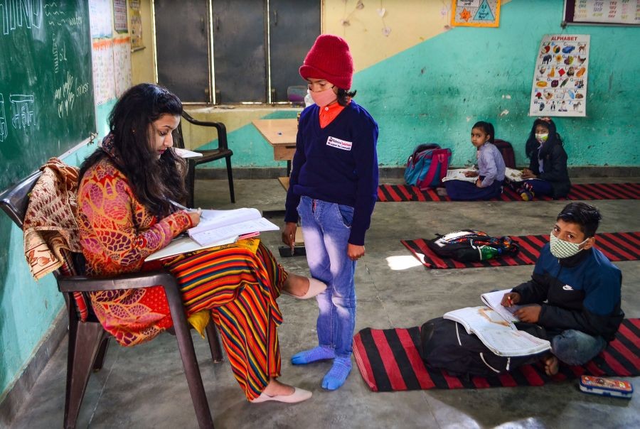 Gurugram: Students attend a class at a school, that was reopened following ease in COVID restrictions, in Gurugram, Thursday, Feb. 10, 2022. (PTI Photo)