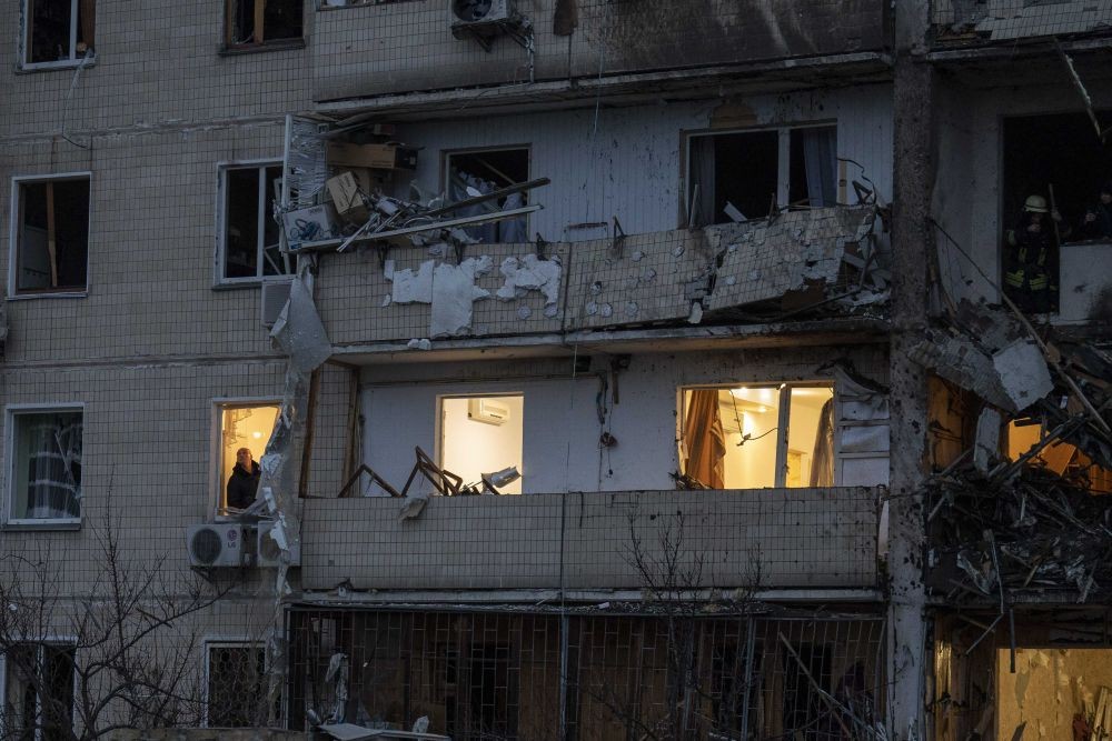 Kyiv: A man inspects the damage at a building following a rocket attack on the city of Kyiv, Ukraine, Friday, Feb. 25, 2022. AP/PTI(
