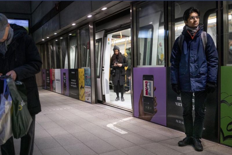 Passengers stand at the Noerreport Metrostation in Copenhagen Denmark, Tuesday, Feb. 1, 2022. Denmark has become one of the first European Union countries to scrap most pandemic restrictions as the country no longer considers the COVID-19 outbreak “a socially critical disease.” Bit by bit, many countries that have been especially hard-hit by the coronavirus are easing their tough, and often unpopular, restrictive measures to fight COVID-19 even as the omicron variant — deemed less severe — has caused cases to skyrocket. (AP Photo)