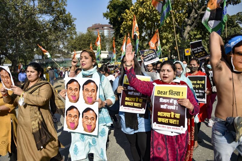 Indian Youth Congress stage a protest against  Assam Chief Minister Hemant Biswa Sharma over his remark on party leader Rahul Gandhi, outside Shastri  Bhawan in New Delhi on February 13, 2022. (PTI Photo)