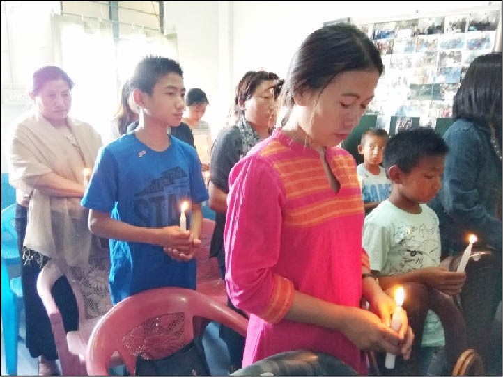Observance of International AIDS Candlelight Memorial in Kohima on May 19.