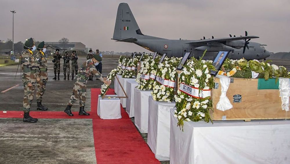 FEB. 12, 2022**Tezpur: General Officer Commanding, Gajraj Corps Lt Gen Ravin Khosla with other military officials pay respects to the fallen army soldiers, in Tezpur. The seven army soldiers, who were stuck in an avalanche in Arunachal Pradesh died on Feb. 06. (PTI Photo)