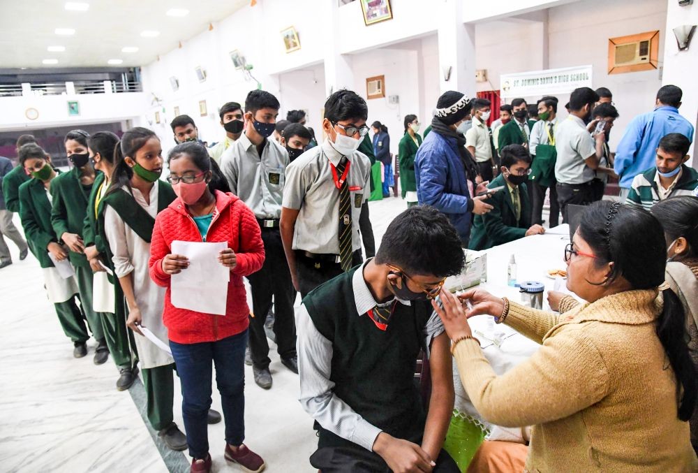 Patna: Students receive COVID-19 vaccine dose at a school, in Patna, Tuesday, Feb.15, 2022. (PTI Photo)