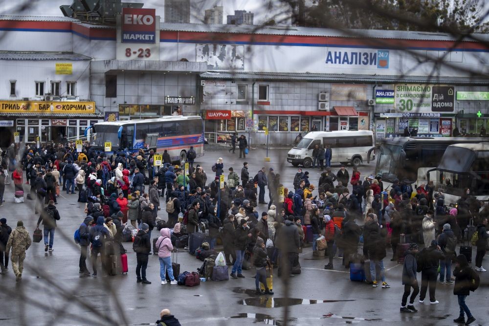 Kyiv : People try to get onto buses to leave Kyiv, Ukraine, Thursday, Feb. 24, 2022.  AP/PTI